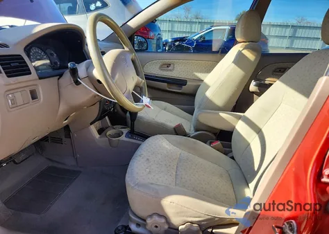 2003 Kia Rio z USA, uszkodzony, nr VIN KNADC125536216836